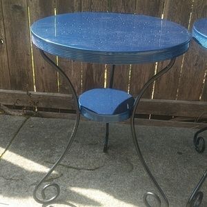 Two metal outside tables